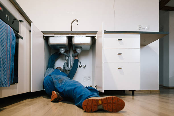 Professional Emergency Plumber technician working in Rowe, MA